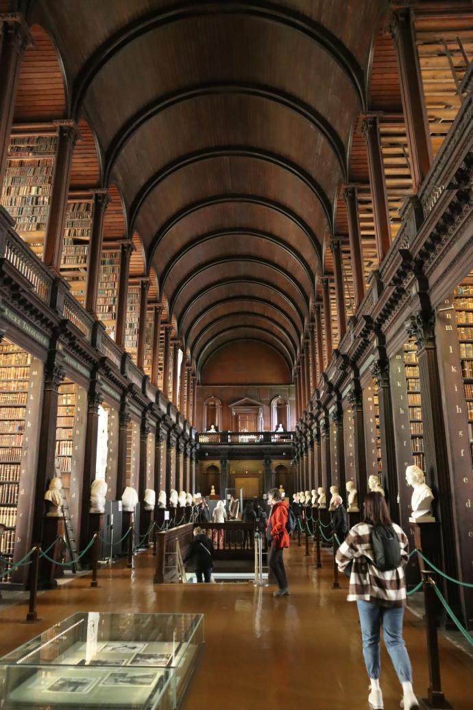 a long room filled with lots of books