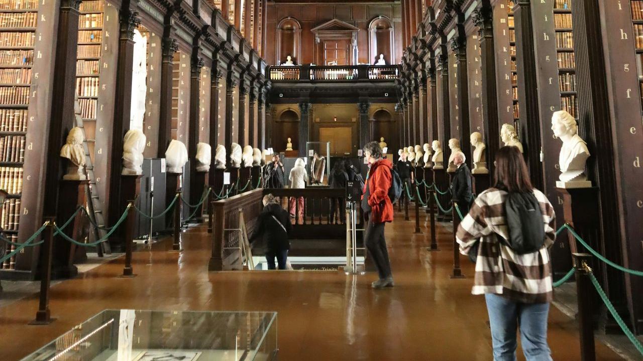 a long room filled with lots of books