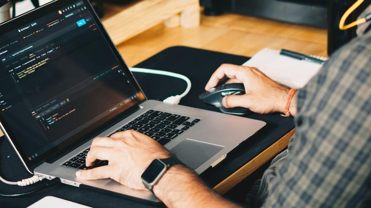 man using laptop